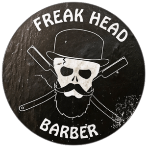 Freak Head Barber wanted sticker spotted in Bangkok in 2025