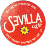 Sevilla café wanted sticker spotted in Bangkok in 2025