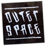 Outer Space wanted sticker spotted in Prague in 2026