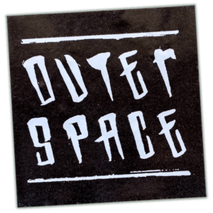 Outer Space wanted sticker spotted in Prague in 2026