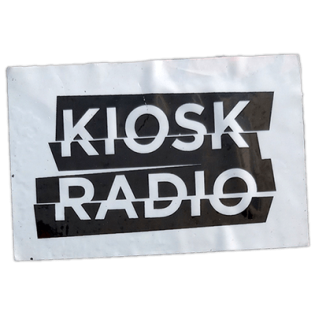 Kiosk Radio wanted street sticker spotted in Prague in 2025