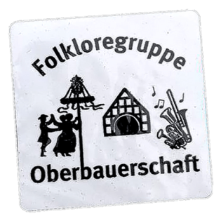 Folkloreguppe Obervauerschaft wanted street sticker spotted in Prague in 2025.
