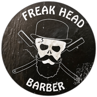 Freak Head Barber wanted sticker spotted in Bangkok in 2025