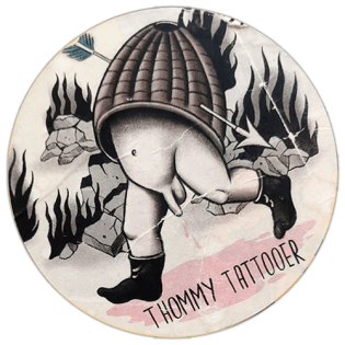 Thommy Tattooer wanted sticker spotted in Bangkok on 2025