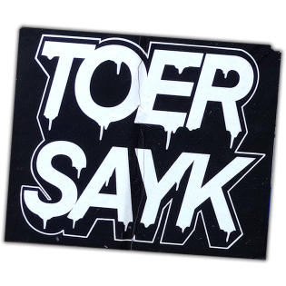 Toer Sayk wanted sticker spotted in Prague in 2026