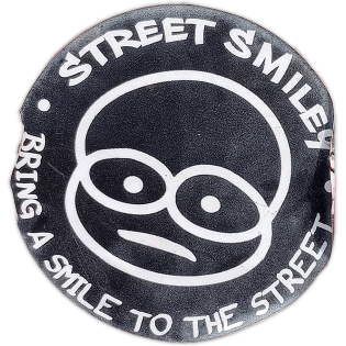 Street Smiley sticker spotted in Prague in 2026