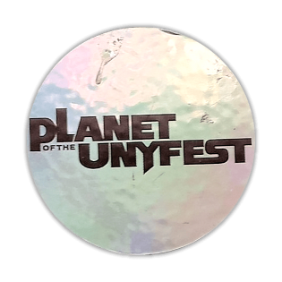 Planet of the Unyfest sticker spotted in Prague in 2026